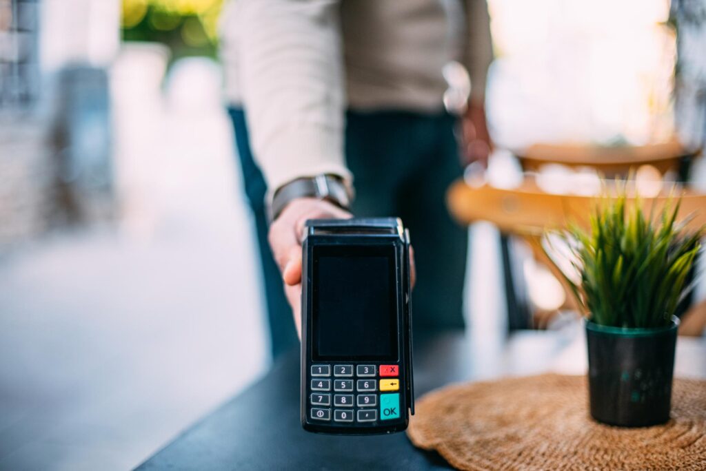 Waiter Holding Pos Device For Contactless Payment